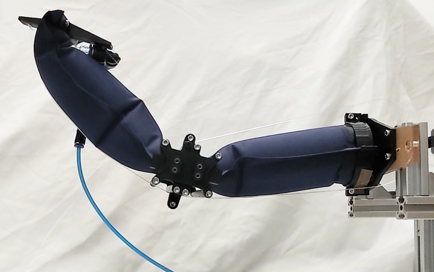 Toward Octopus-inspired Whole arm Manipulation: A Sliding Pseudo-joint for Soft Pneumatic Robot Arm